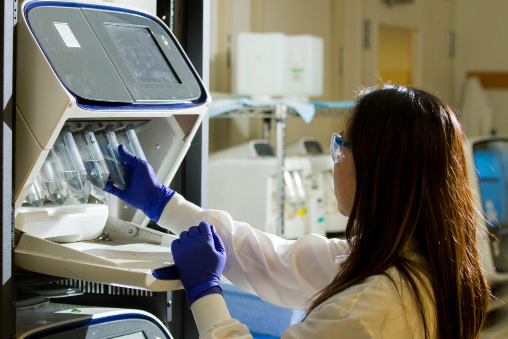 A pediatric cancer
researcher using genome sequencing equipment.